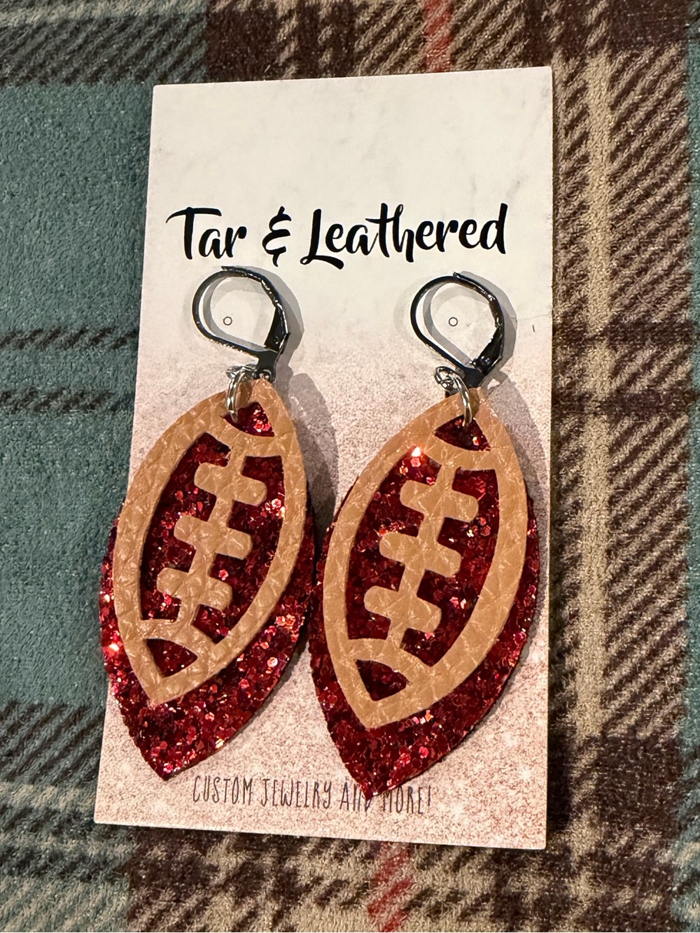 Tar & Leathered Red Glitter Football Earrings